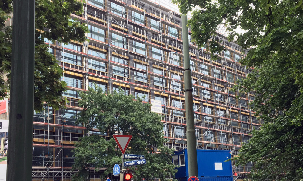 Mehrfamilienhaus Wohnungsbau und Gewerbebau in München von Architekturbüro Ralf Kohlbecker Huglfing